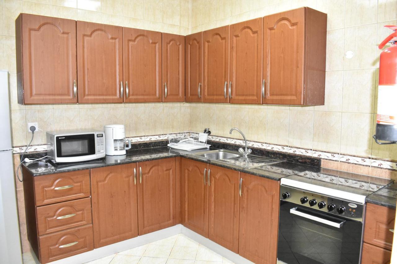Al Misrea Tower Apartman Manáma Kültér fotó